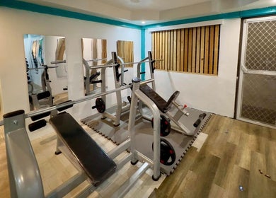 Modern workout equipment at Detox Wellness, San Fernando, Ilocos Region, PH, offering a serene fitness environment.