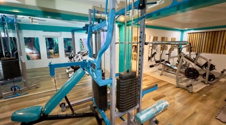 Modern gym equipment in a bright setting at Detox Wellness, San Fernando, Ilocos Region, PH.