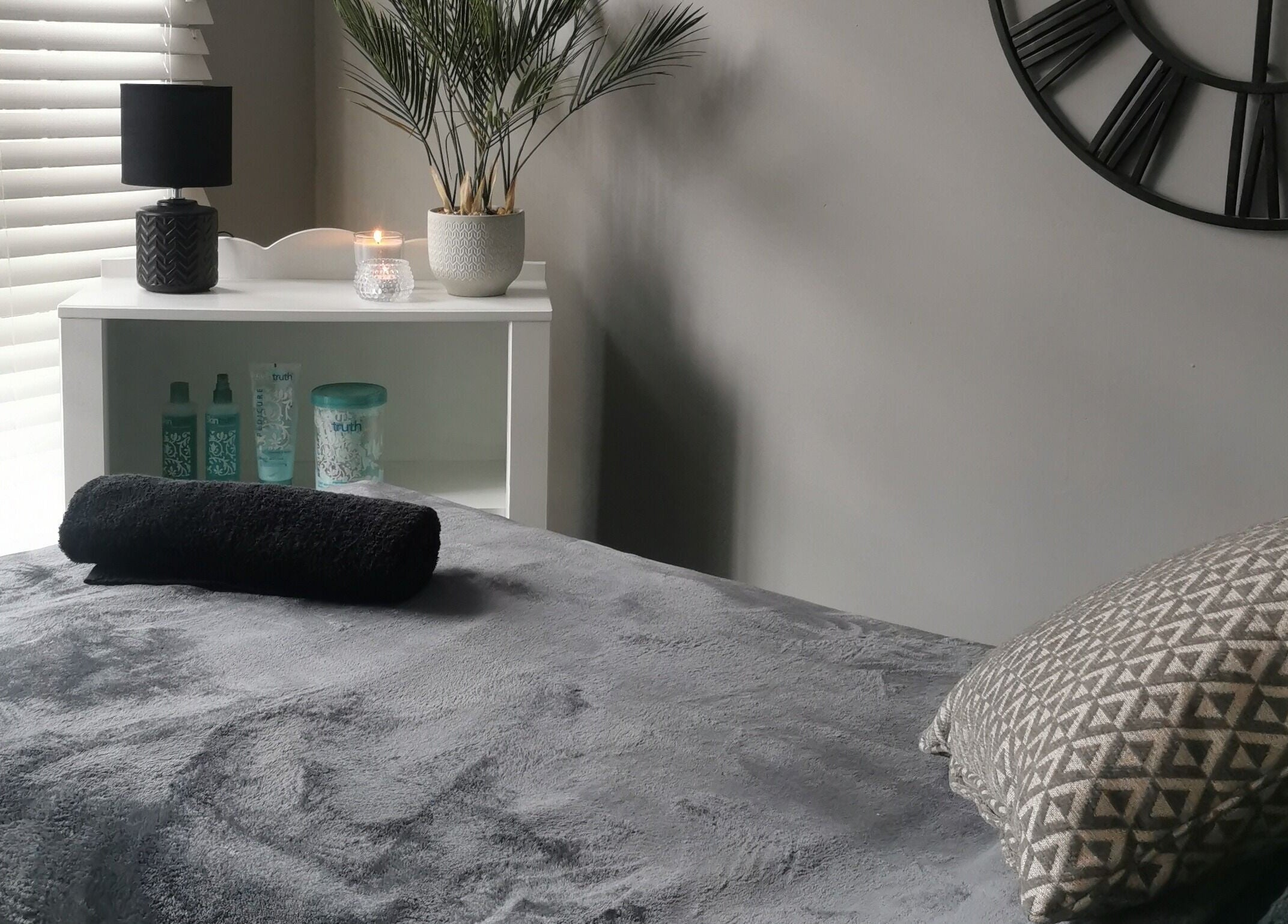 Relaxing spa room at True Beauty Boroughbridge, Boroughbridge, England, GB with plush bed and cozy decor.