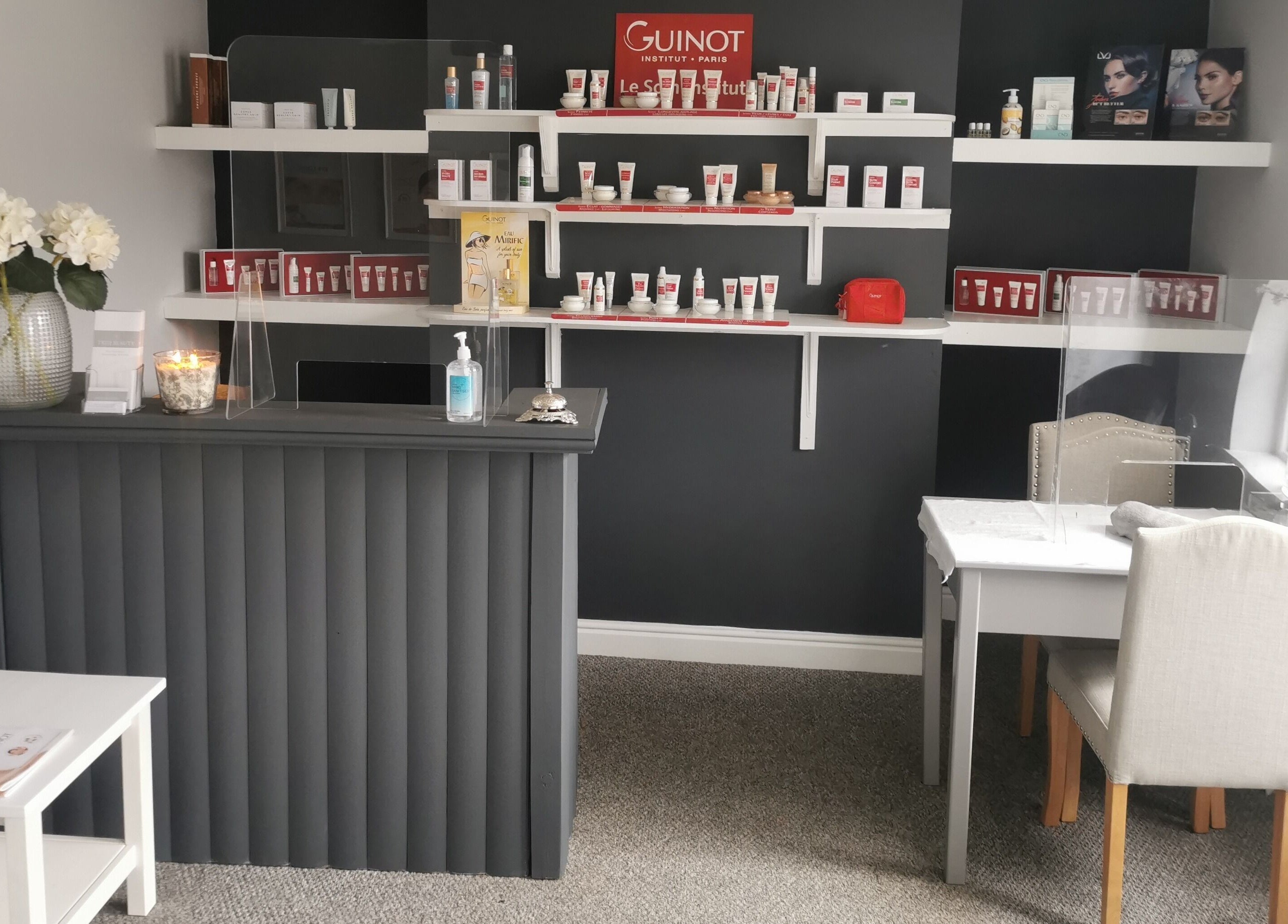 Stylish beauty counter at True Beauty Boroughbridge in Boroughbridge, England, GB with elegant product displays.