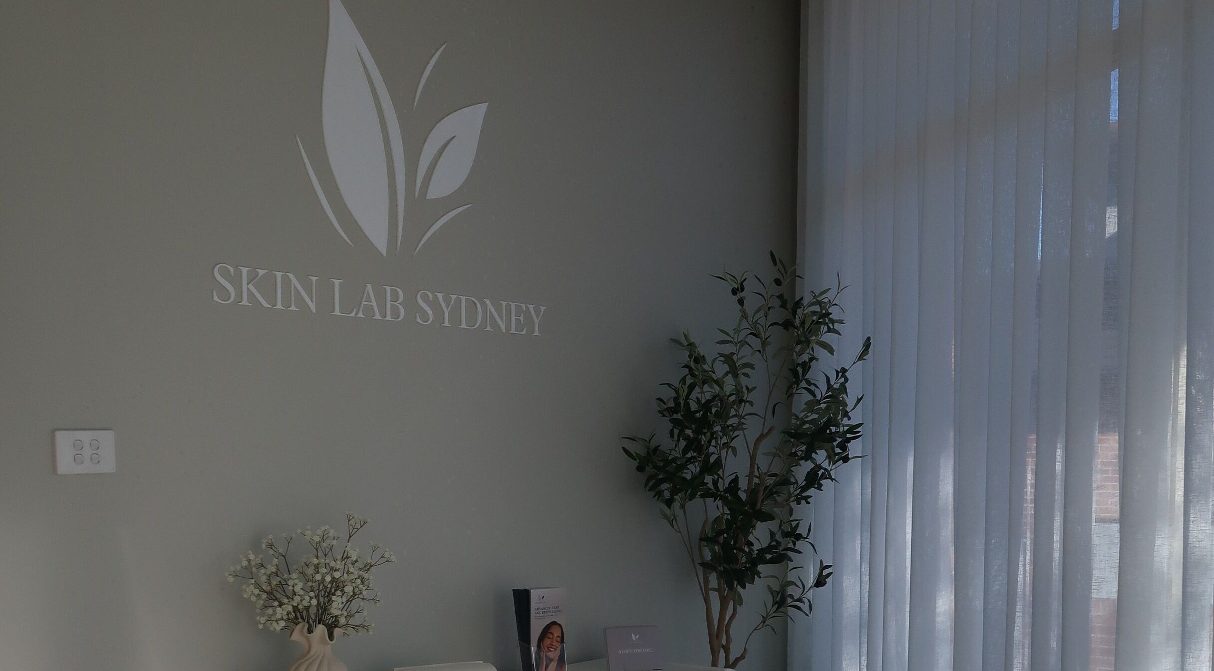 Elegant interior of Skin Lab Sydney, Oatlands, New South Wales, AU with calming decor.