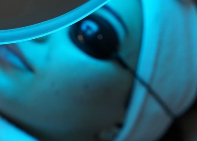 Facial treatment under blue light at Skin Lab Sydney, Oatlands, New South Wales, AU.