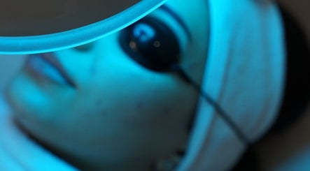 Facial treatment under blue light at Skin Lab Sydney, Oatlands, New South Wales, AU.