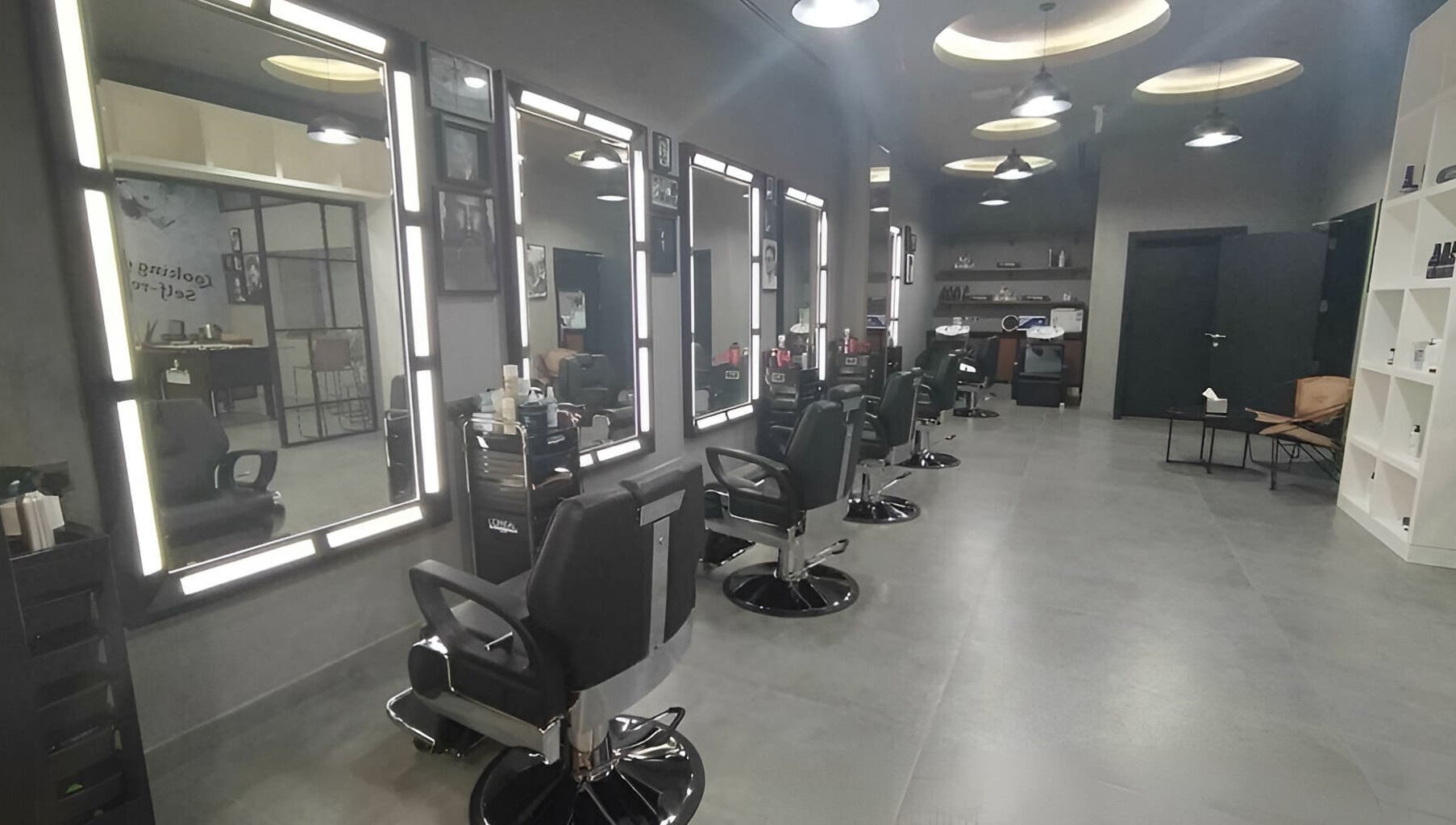 Interior of Le Coiffeur Salon Dar-Al-Salam, showcasing sleek salon chairs in الدوحة, الريان, QA.