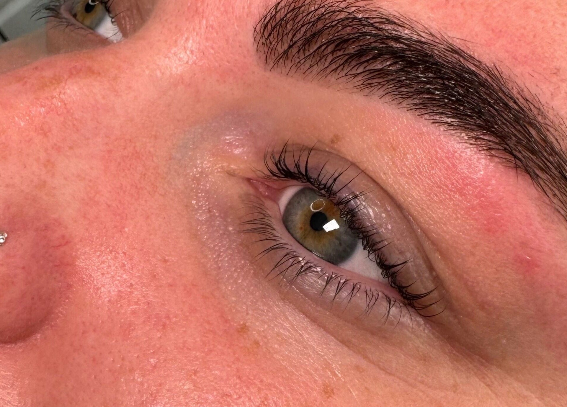 Close-up of perfectly shaped eyebrows at Bennett’s Beauty Bar, Liskeard, England, GB.