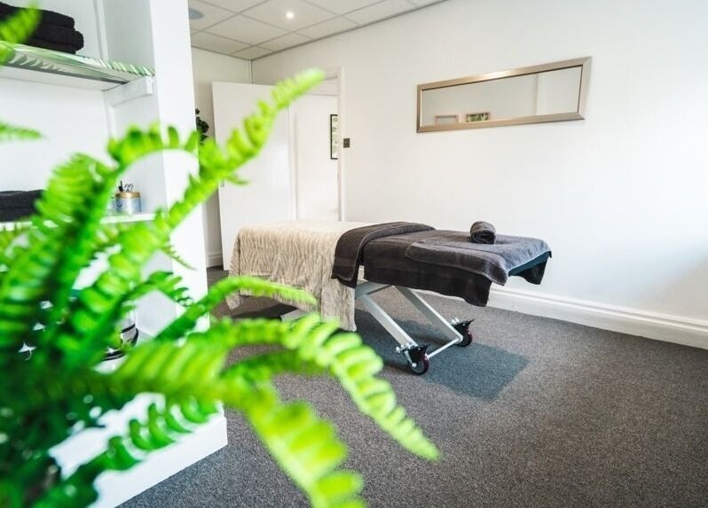 A tranquil treatment room with a massage bed at 1a Above Beauty, Willerby, England, GB.