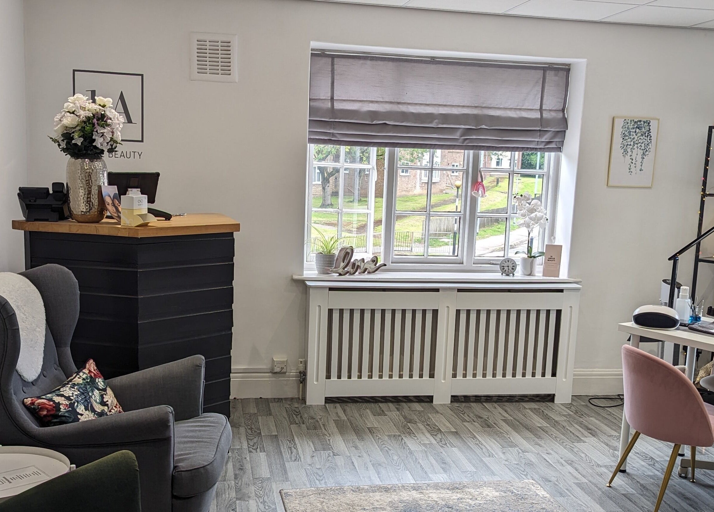 Chic reception area at 1a Above Beauty, Willerby, England, GB with cozy chairs and elegant decor.