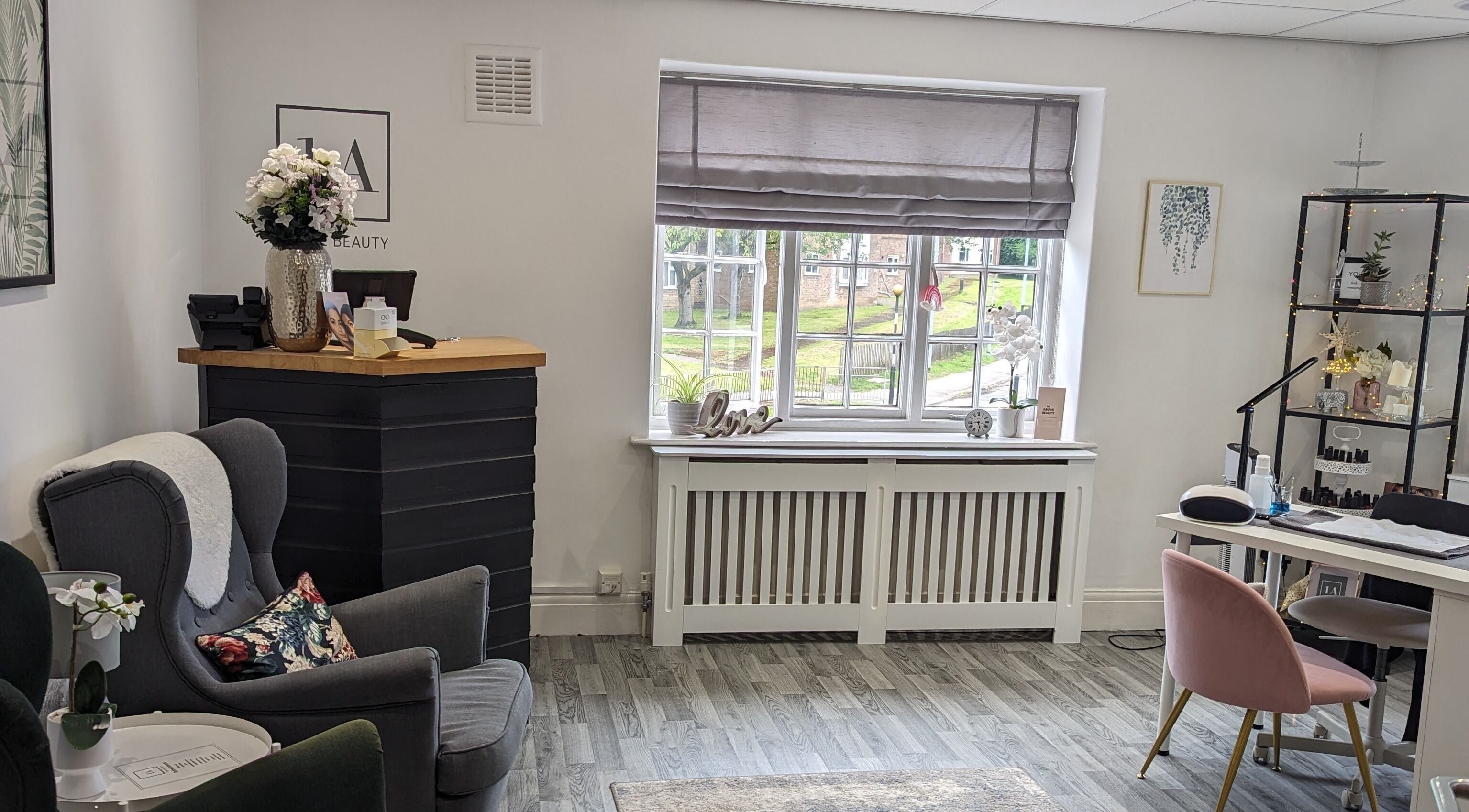 Chic reception area at 1a Above Beauty, Willerby, England, GB with cozy chairs and elegant decor.