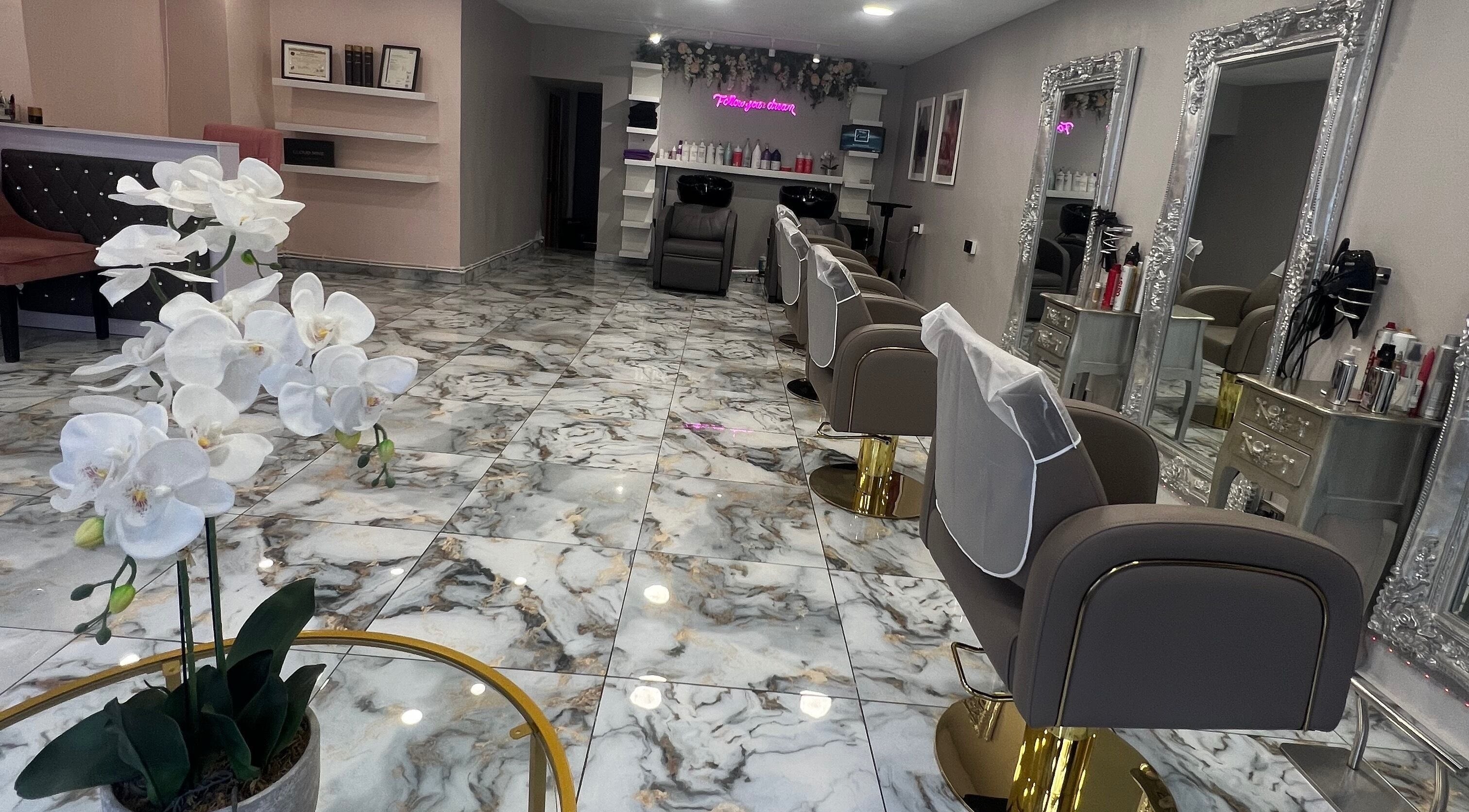 Elegant Hair & Beauty by Nadia salon interior showcasing stylish chairs and mirrors in Newcastle upon Tyne, England, GB.