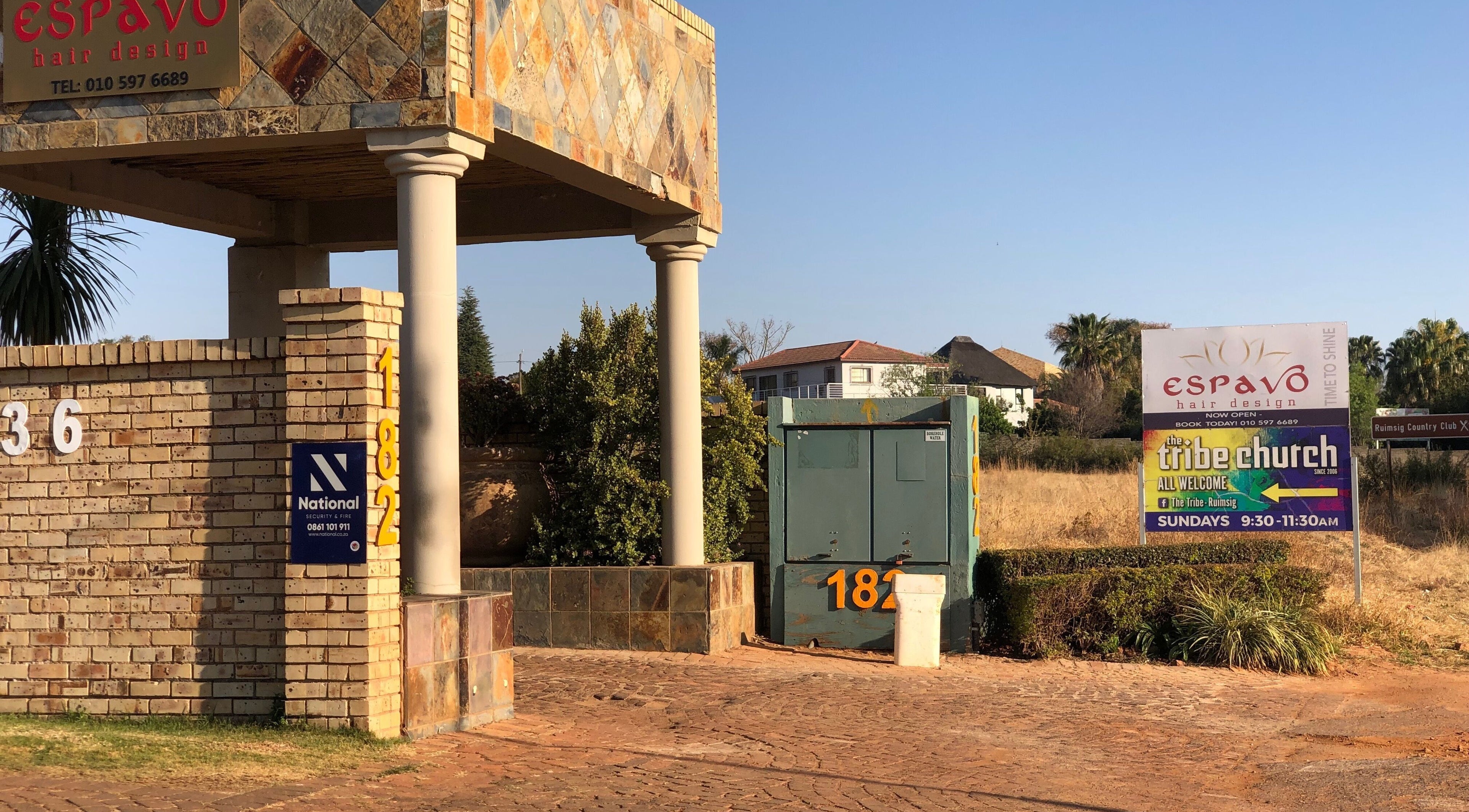 Entrance to Espavo Hair Design near The Wax Pots Ruimsig, Roodepoort, Gauteng, ZA with visible signage.
