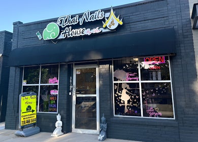 Exterior of Thai Nails House by Ann, a stylish salon in Denver, Colorado, US, with vibrant signage and decor.