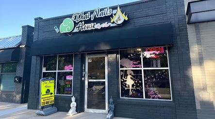 Exterior of Thai Nails House by Ann, a stylish salon in Denver, Colorado, US, with vibrant signage and decor.
