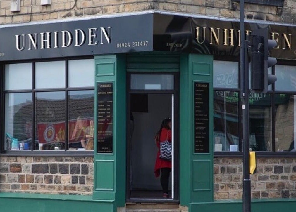 Street view of Hair by Demi at UNHIDDEN, Ossett, England, GB showcasing elegant storefront and entrance.