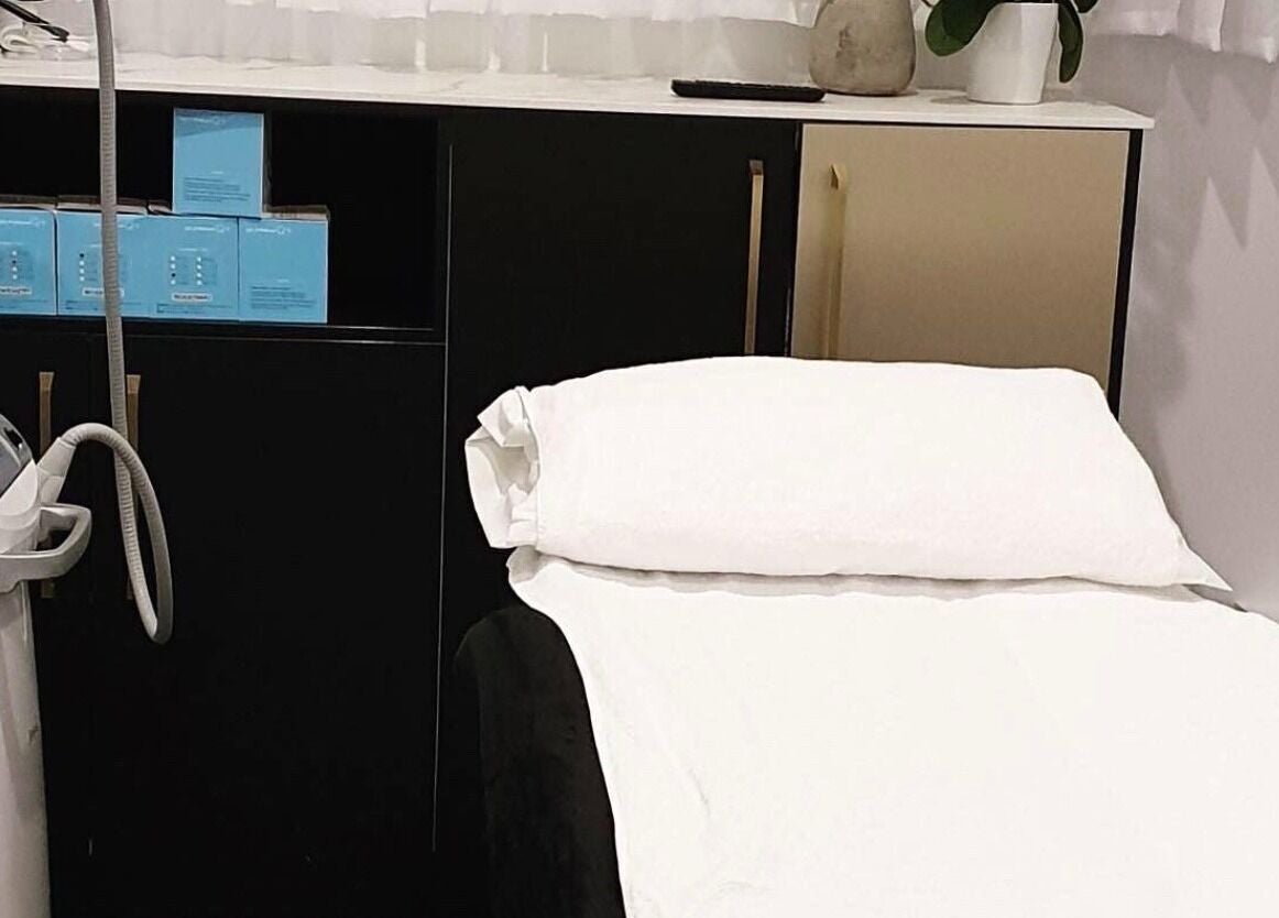 Modern Aesthetics treatment room with equipment in Woolooware, New South Wales, AU.