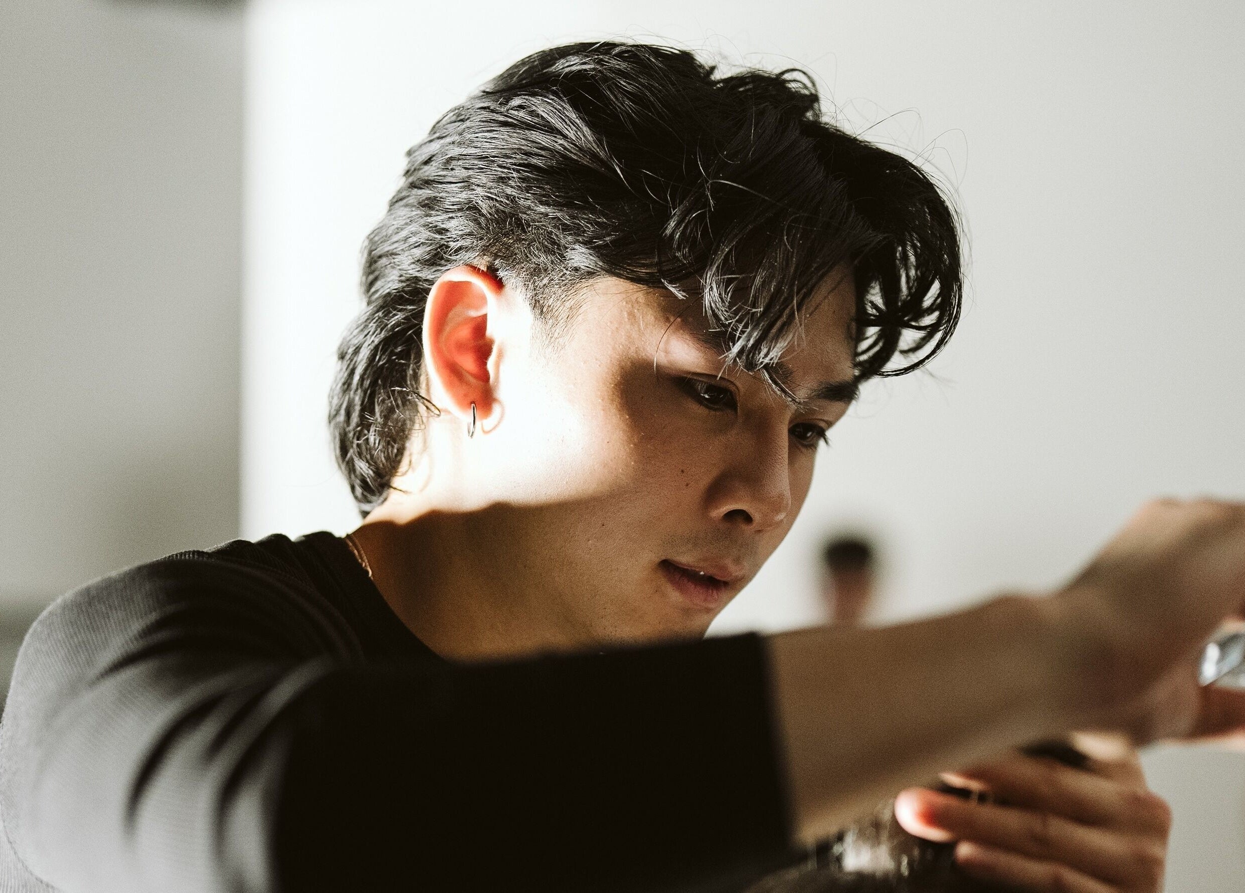 Expert barber crafting a haircut at NewtsTheBarber x KapitalCuts, Perth, Western Australia, AU.