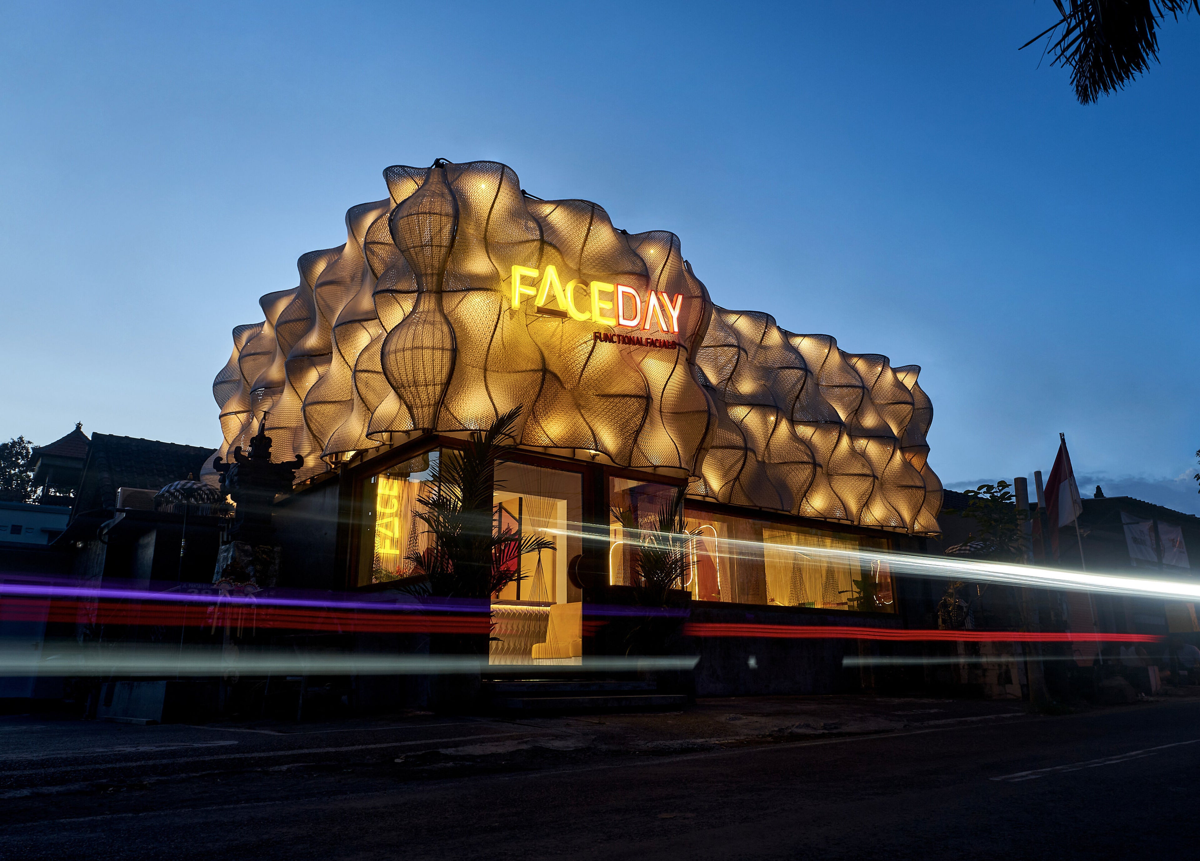 Stunning illuminated architecture of FaceDay in Bali, Bali, ID, glowing against the evening sky.