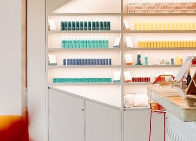 FaceDay wellness products neatly organized on sleek shelves in a stylish venue, Bali, Bali, ID.