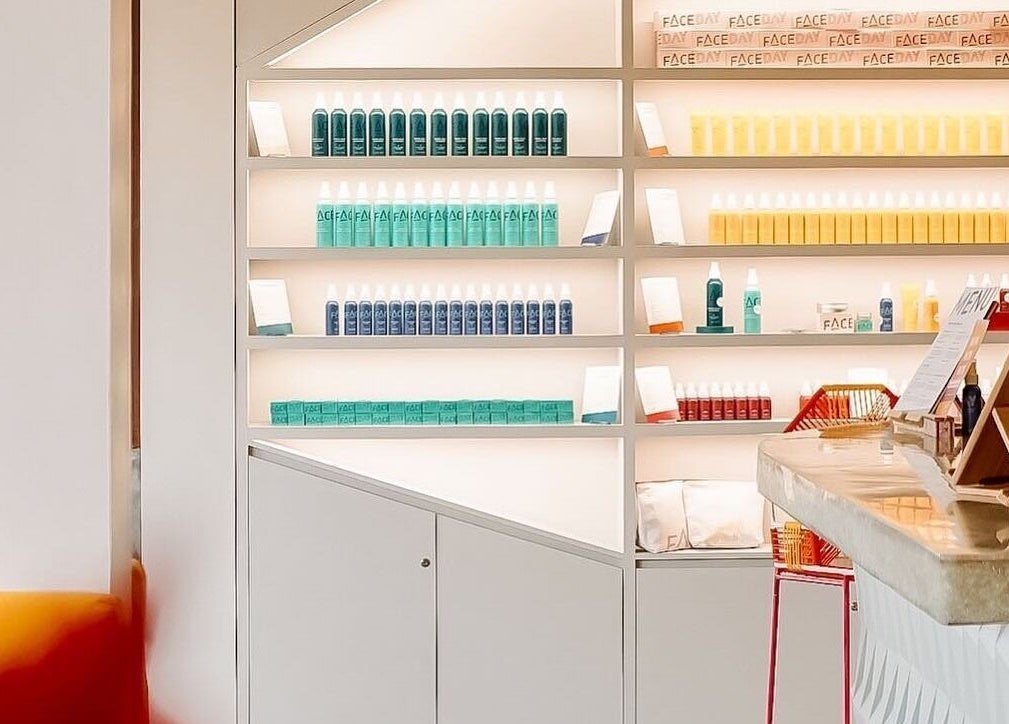FaceDay wellness products neatly organized on sleek shelves in a stylish venue, Bali, Bali, ID.