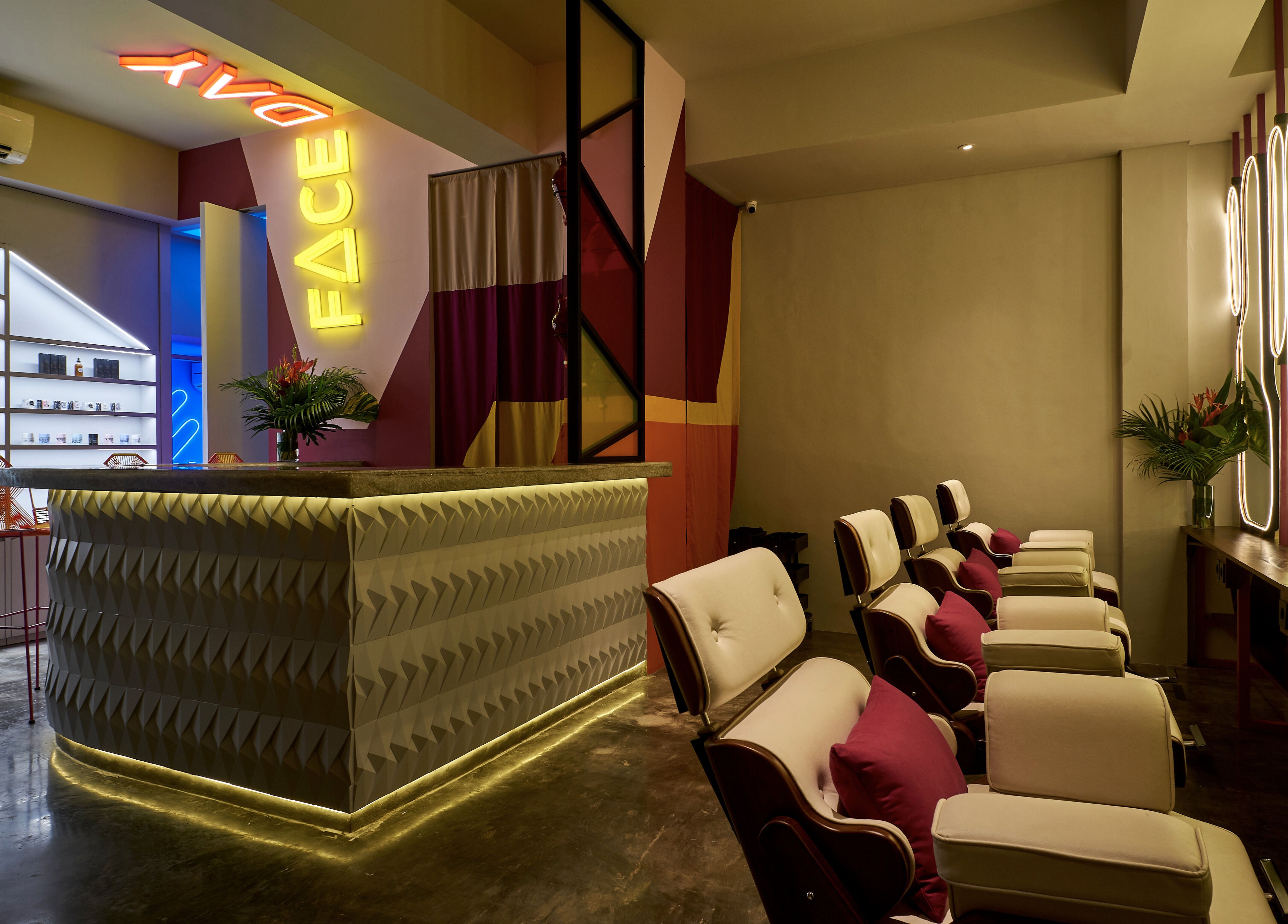 Modern lounge at FaceDay, Bali, Bali, ID with neon lights and elegant seating for wellness treatments.