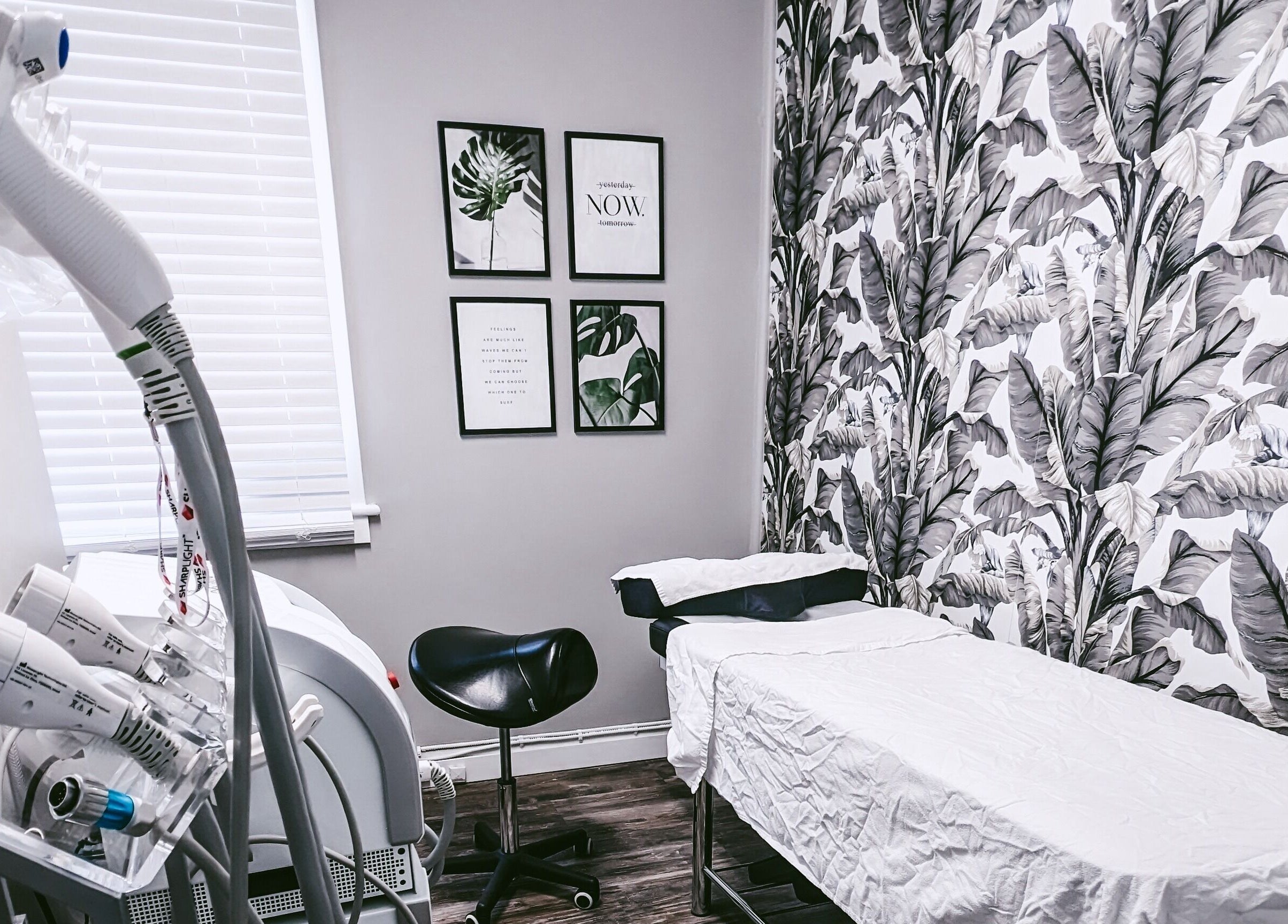Modern treatment room at Beauty Box in Collingwood, Ontario, CA with tropical decor and advanced equipment.