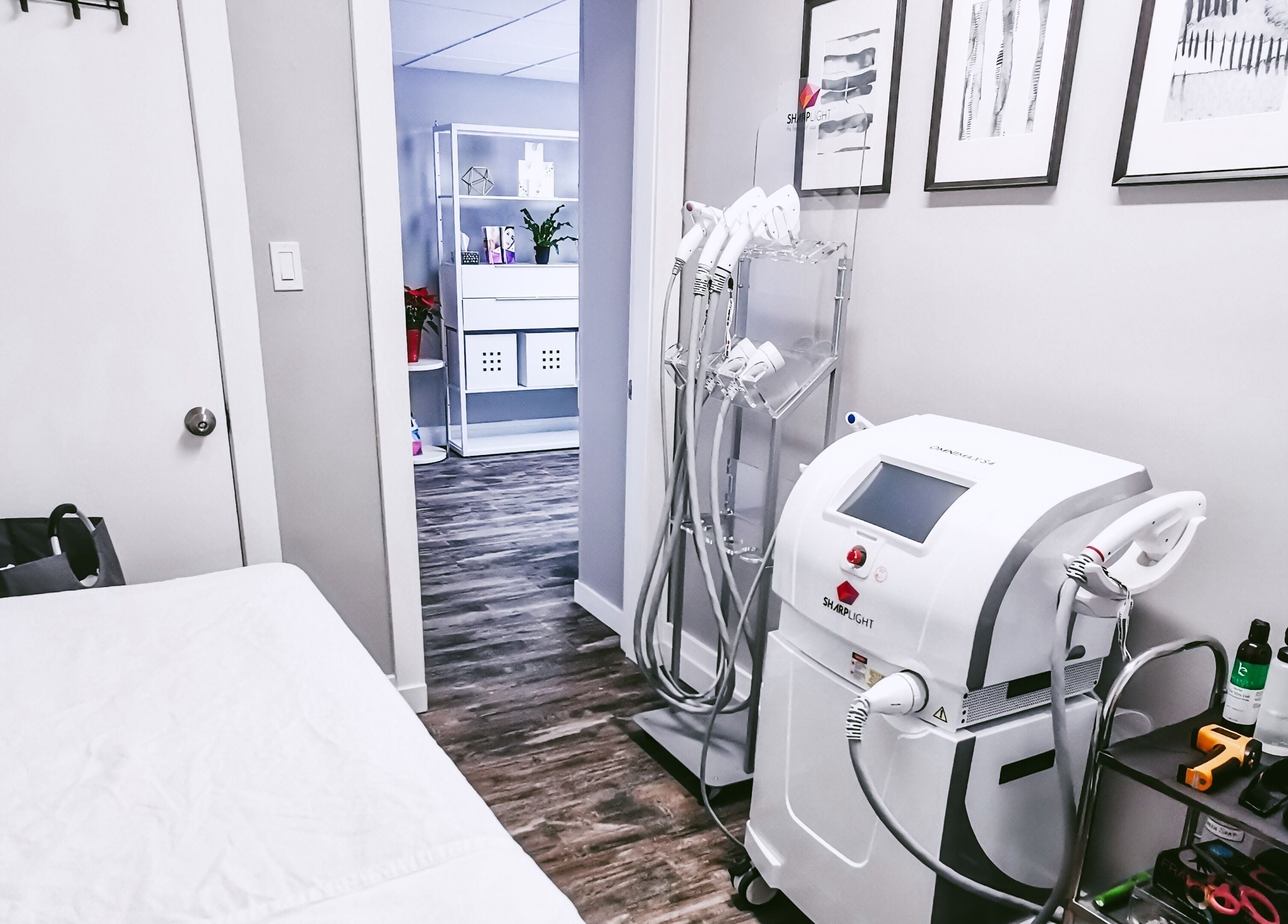 Modern skincare treatment room at Beauty Box, Collingwood, Ontario, CA featuring advanced equipment and cozy setup.