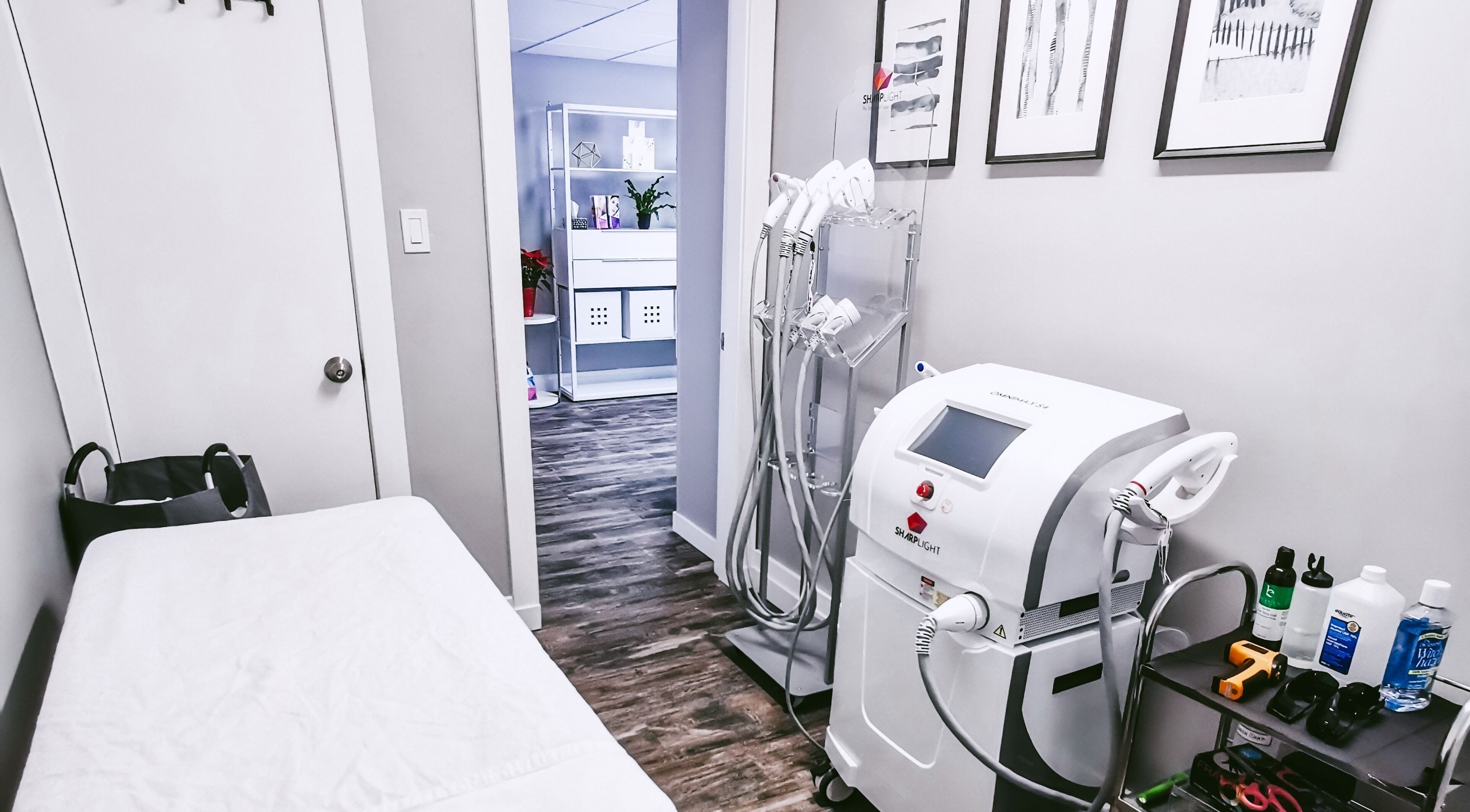 Modern skincare treatment room at Beauty Box, Collingwood, Ontario, CA featuring advanced equipment and cozy setup.