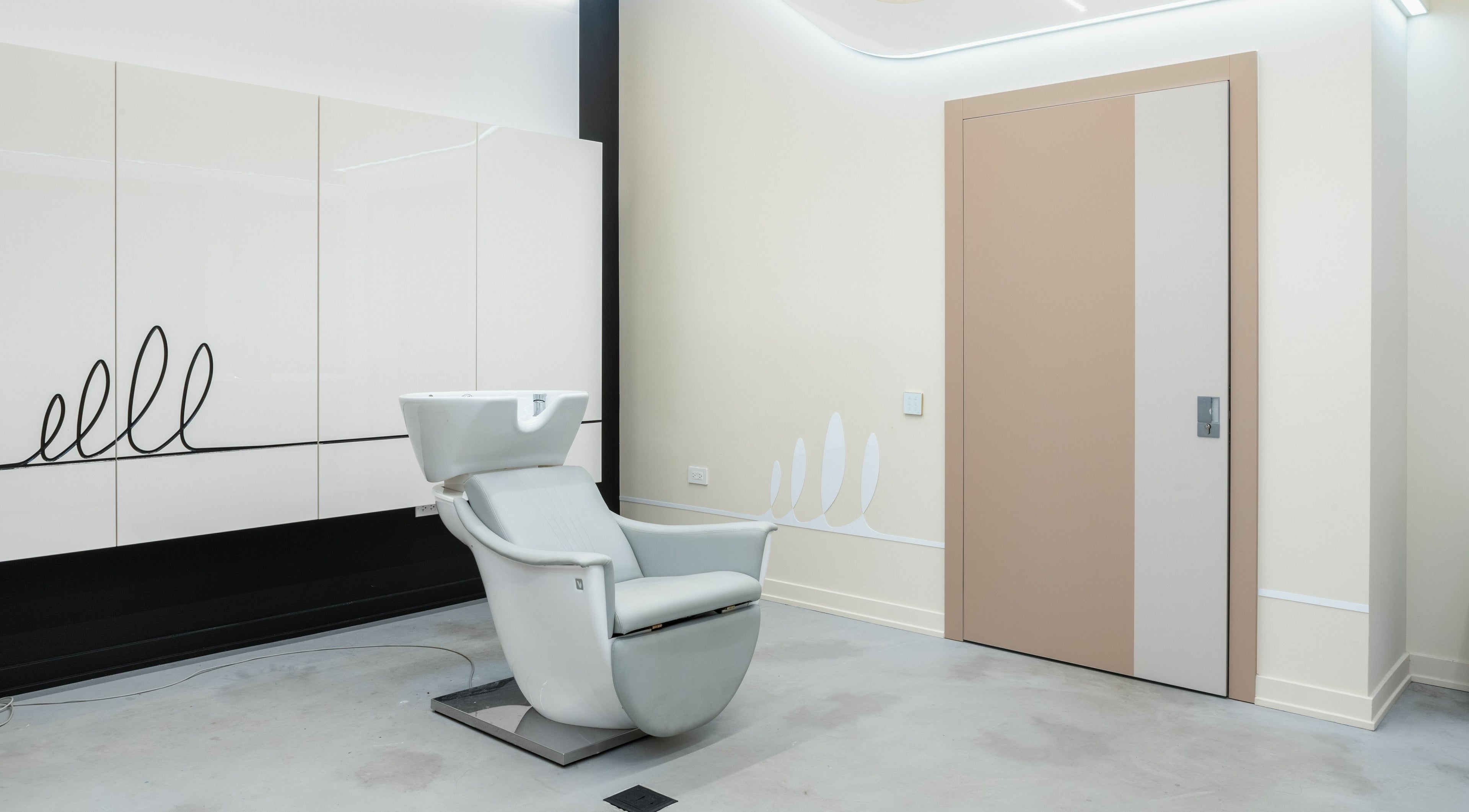 Modern salon chair at Celebrity Lashes Beauty Bar, Chicago, Illinois, US.