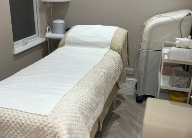 Cozy treatment room at Exclusive Beauty Spa, Sutton Coldfield, England, GB, featuring a comfortable spa bed.