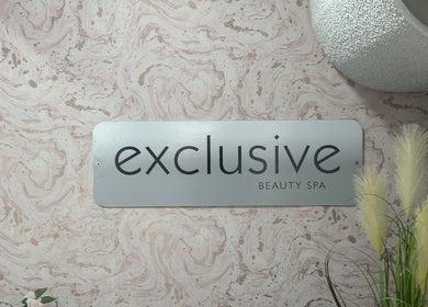 Exclusive Beauty Spa sign on marble wall in Sutton Coldfield, England, GB.