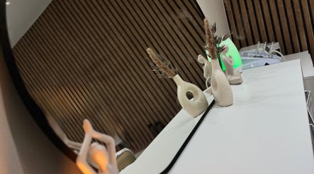 Modern decor with vases at Leyabelle Esthetic Clinic, Barking, England, GB, reflecting elegance and style.