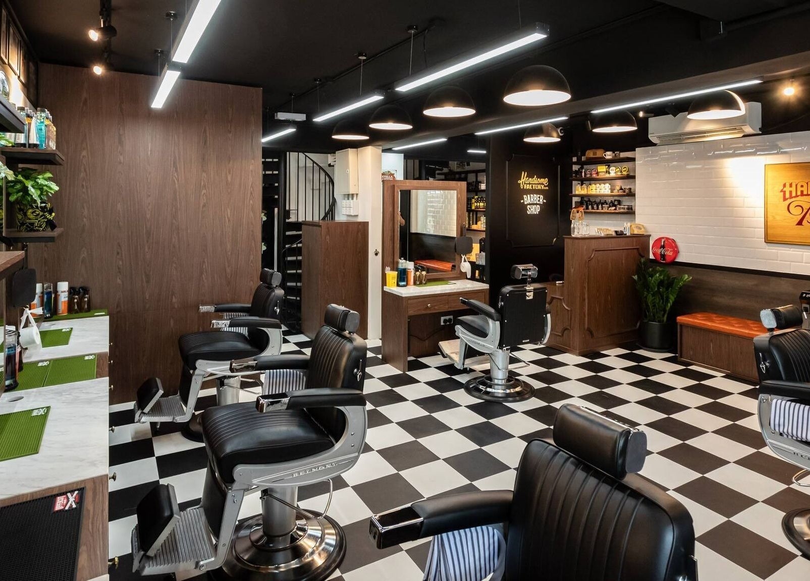 Modern barber chairs inside Tsim Sha Tsui | Handsome Factory Barber Shop, Kowloon, Kowloon, HK.