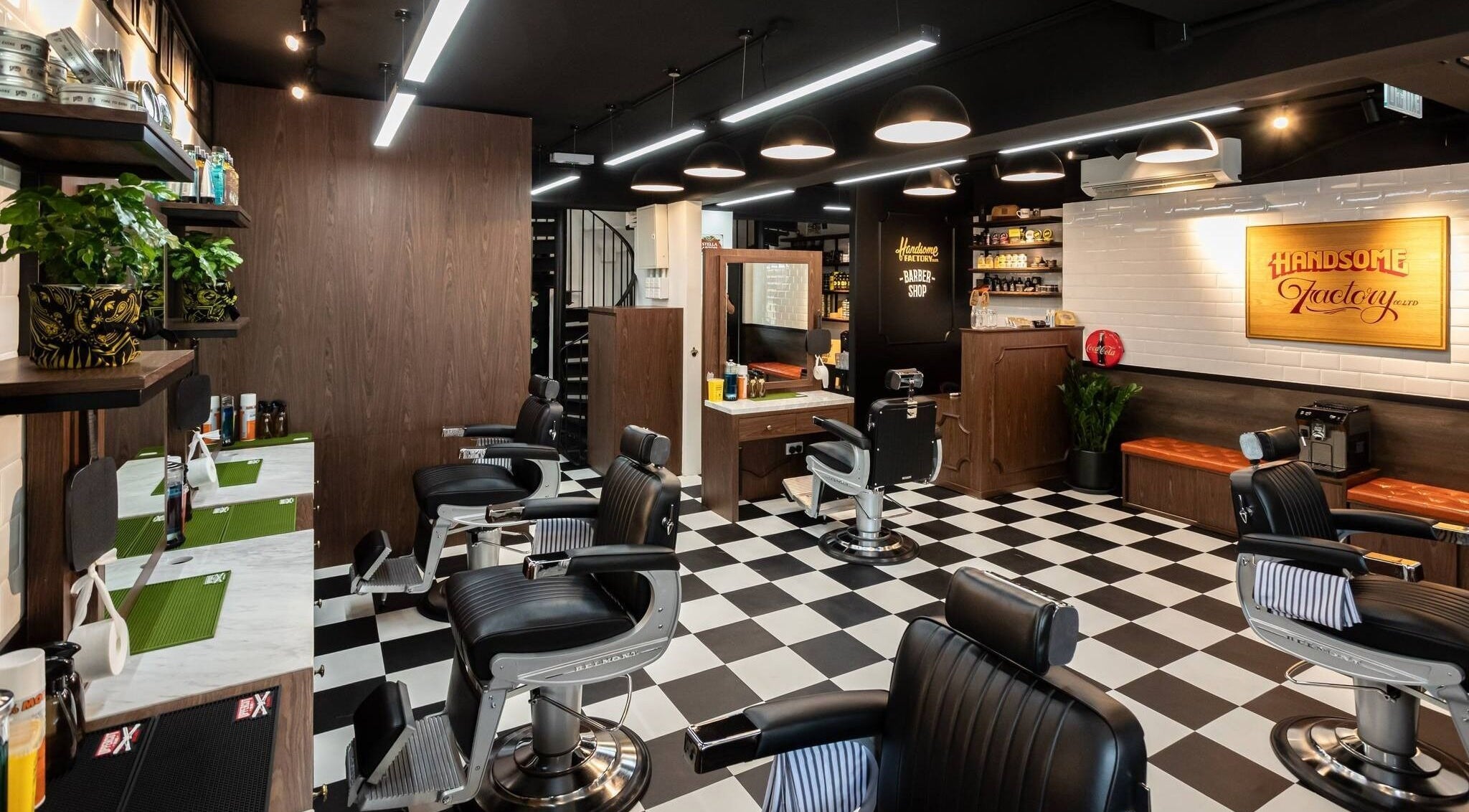 Modern barber chairs inside Tsim Sha Tsui | Handsome Factory Barber Shop, Kowloon, Kowloon, HK.