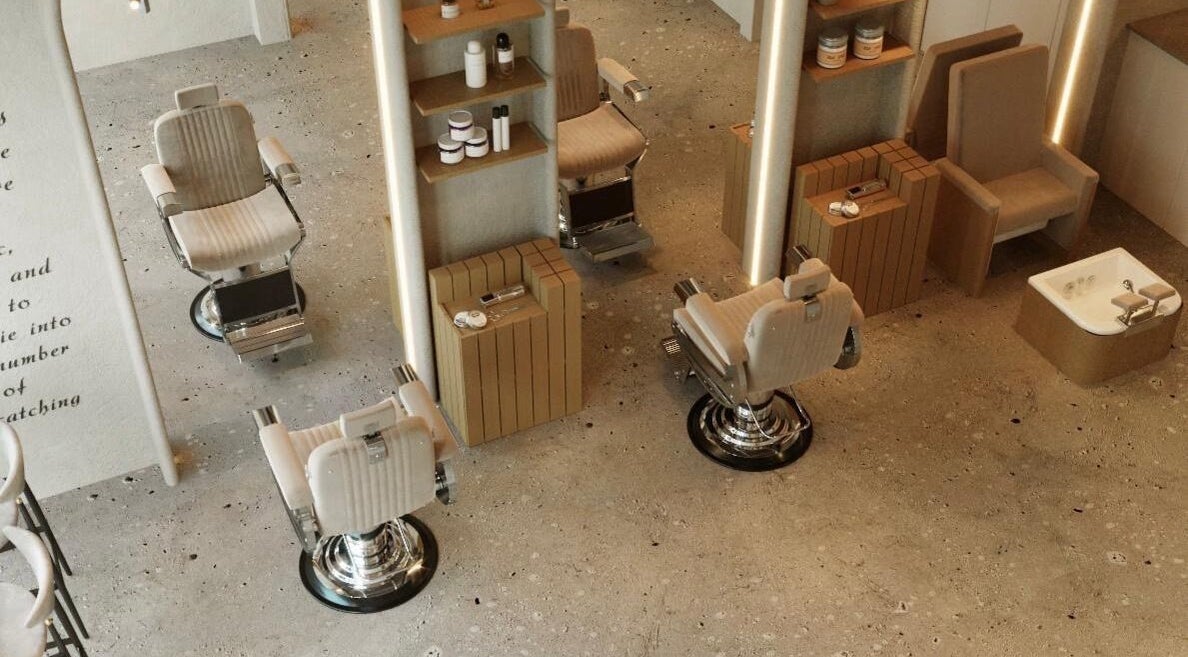 Stylish barber chairs at Wam N Fade, Dubai, Dubai, AE showcasing modern beauty and wellness space.