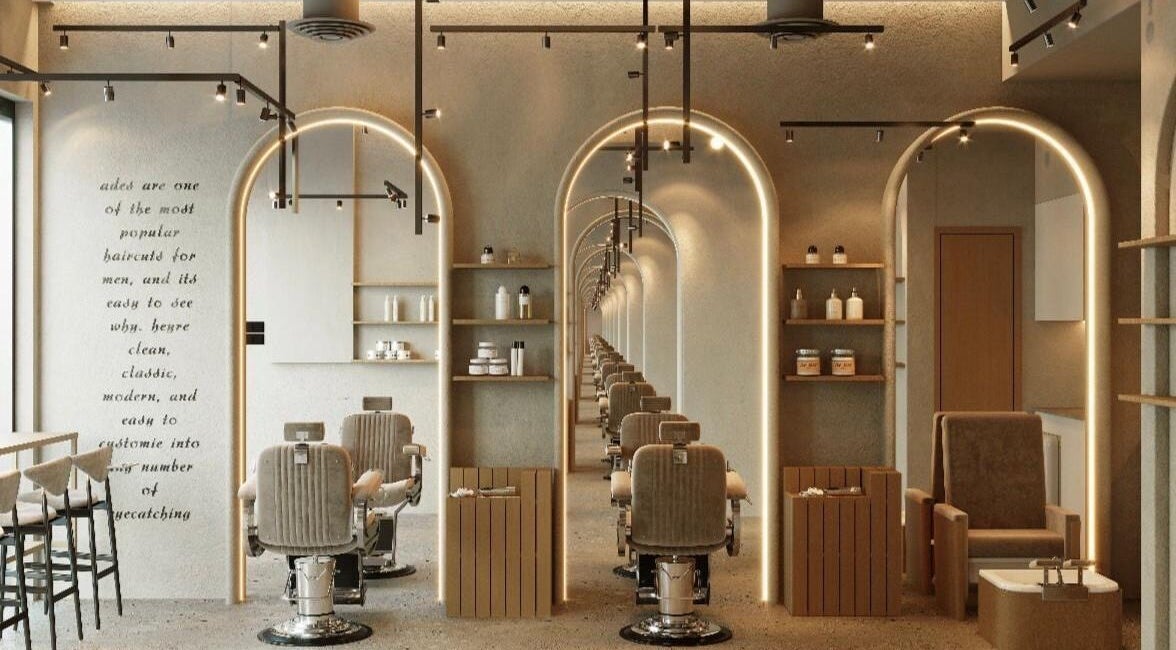 Modern interior of Wam N Fade salon in Dubai, Dubai, AE with stylish chairs and lighting.