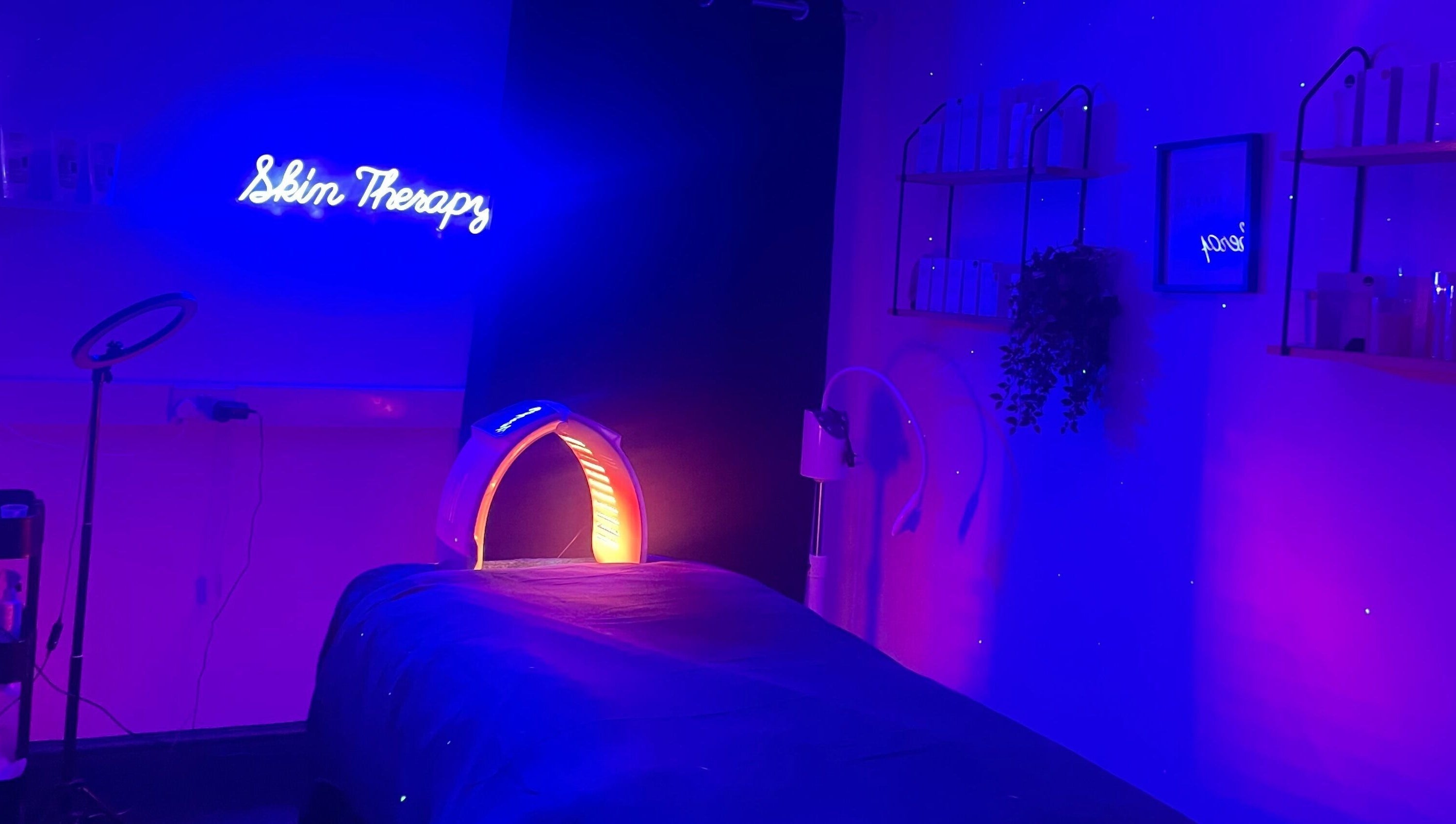 Spasthetics' relaxing therapy room in vibrant blue light, Newcastle-under-Lyme, England, GB.