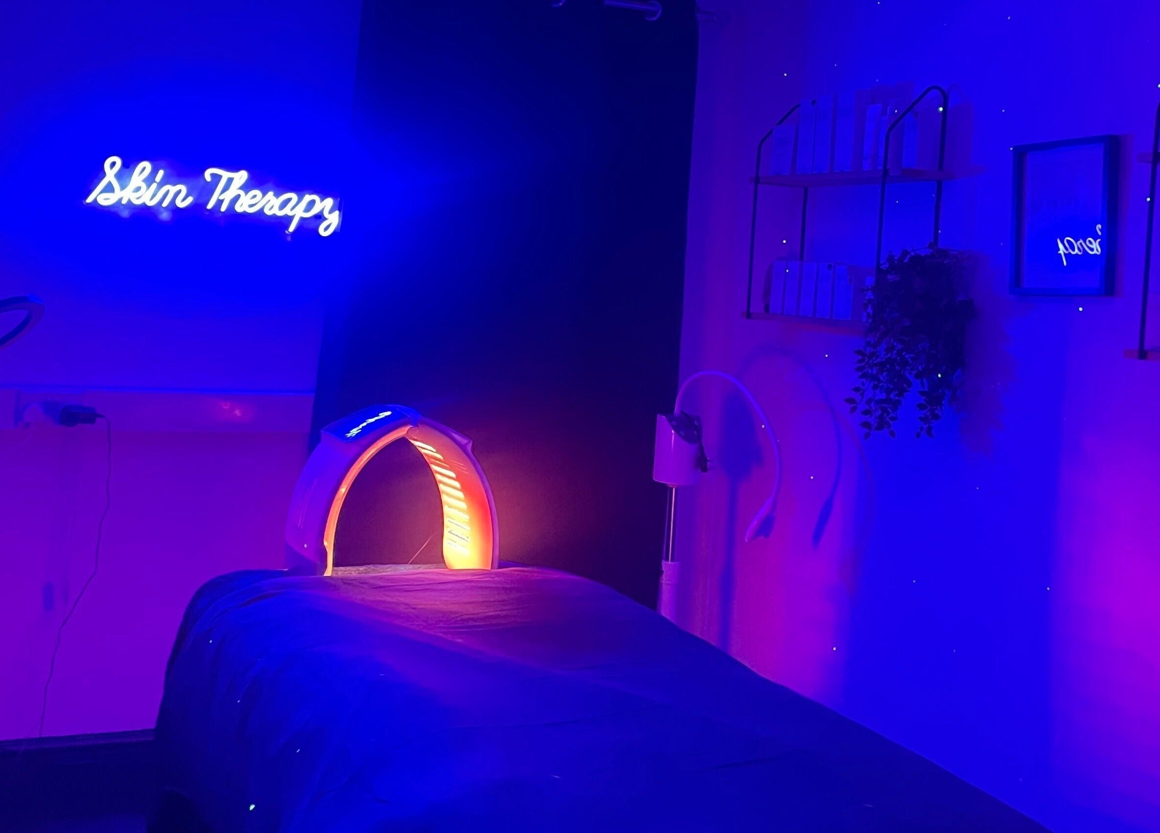 Spasthetics' relaxing therapy room in vibrant blue light, Newcastle-under-Lyme, England, GB.
