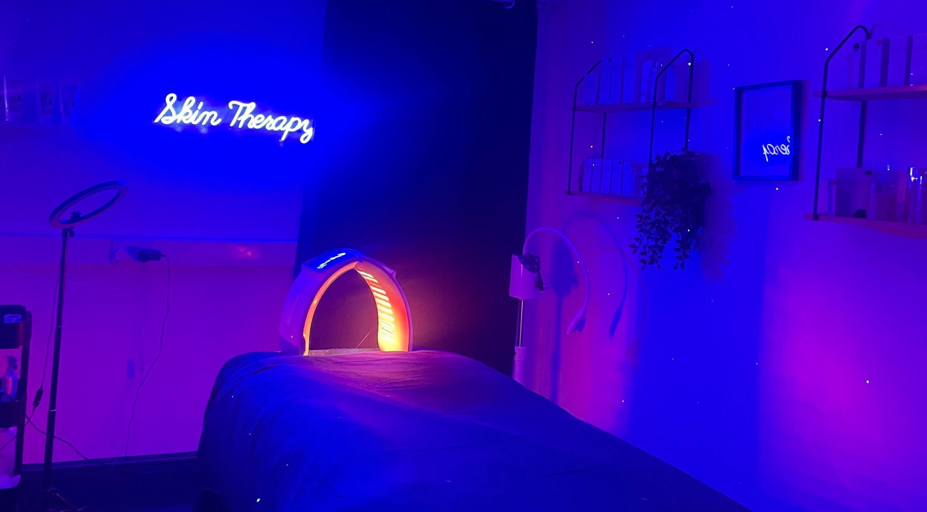 Spasthetics' relaxing therapy room in vibrant blue light, Newcastle-under-Lyme, England, GB.