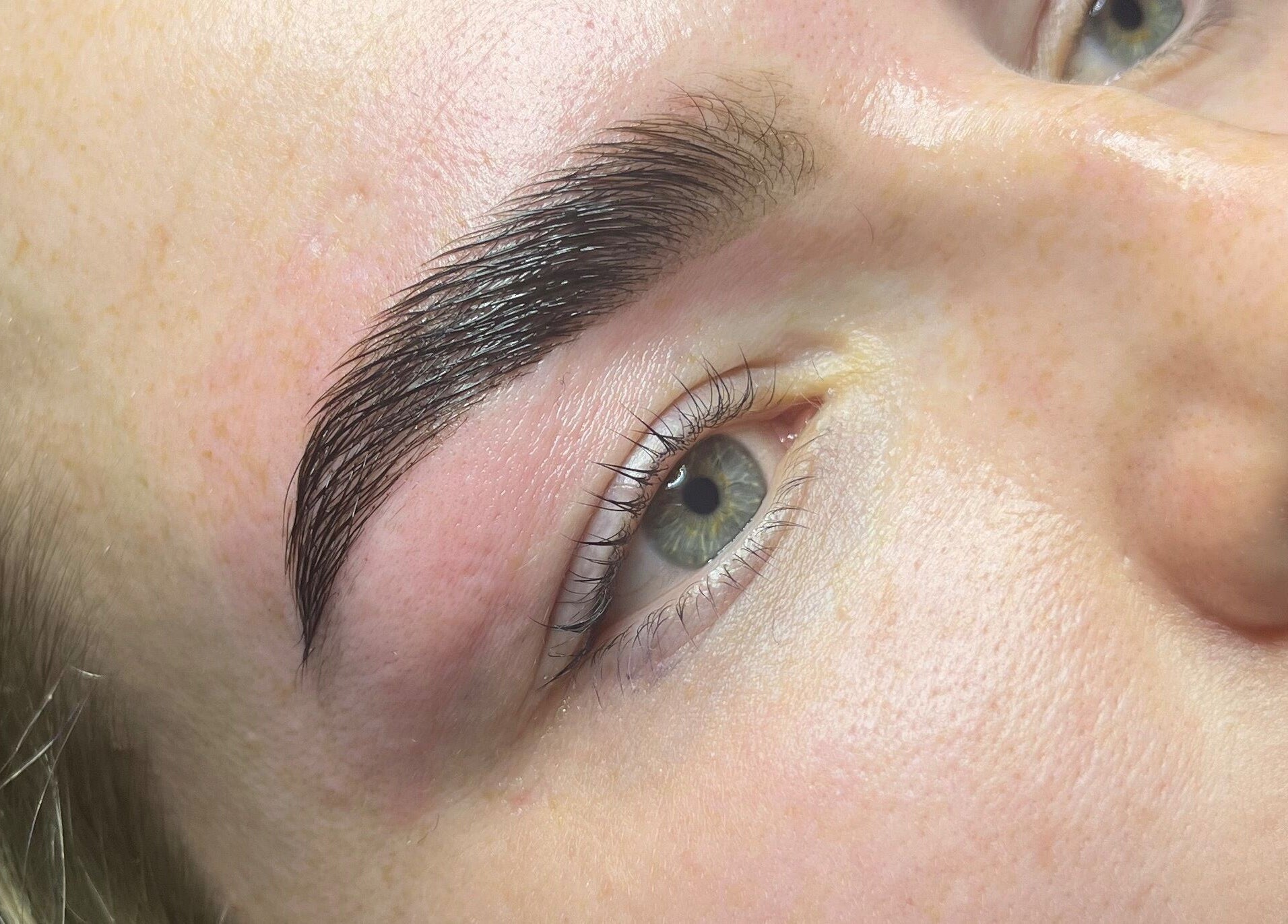 Close-up of eyebrow enhancement at Spasthetics, Newcastle-under-Lyme, England, GB showcasing precise detailing.