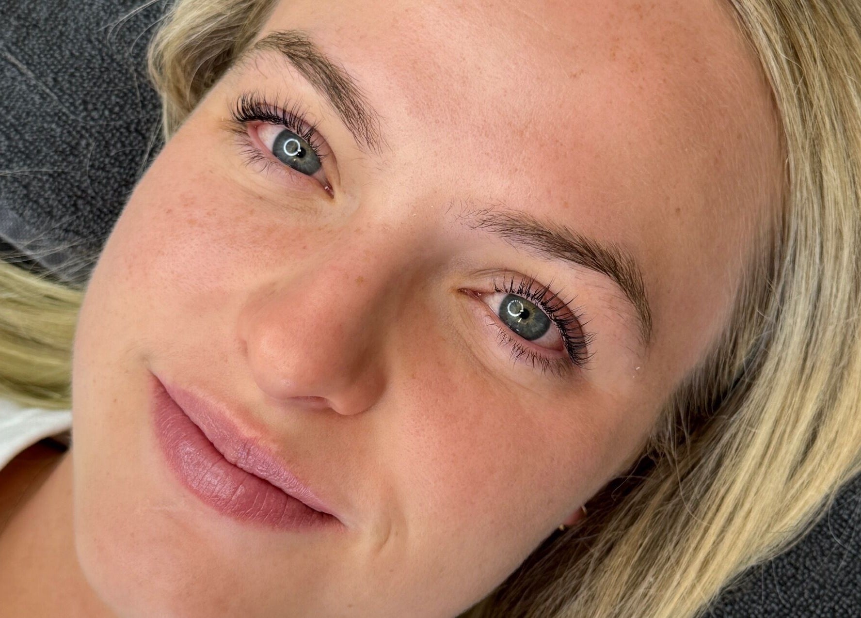 Close-up of a woman's face with natural makeup at The Self Love Lab, Alfredton, Victoria, AU.