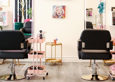 Stylish salon chairs and mirrors at Haircare Pro Salon Academy Shop Qew | Cawthra in Mississauga, Ontario, CA.