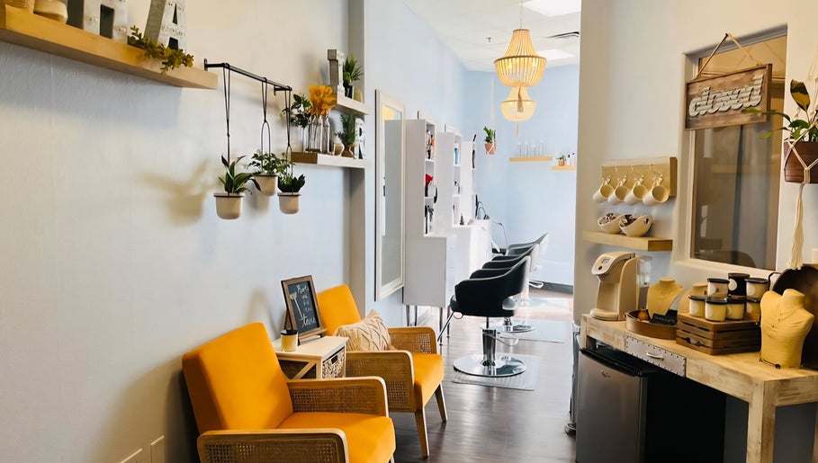 Inviting interior of The Curl Studio in Las Vegas, Nevada, US with comfortable seating and stylish decor.