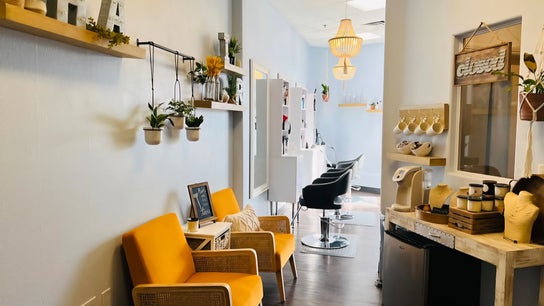 Inviting interior of The Curl Studio in Las Vegas, Nevada, US with comfortable seating and stylish decor.