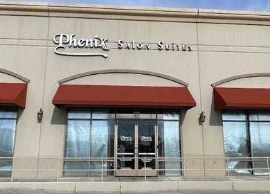 The Curl Studio exterior at Las Vegas, Nevada, US with red awnings and modern storefront.