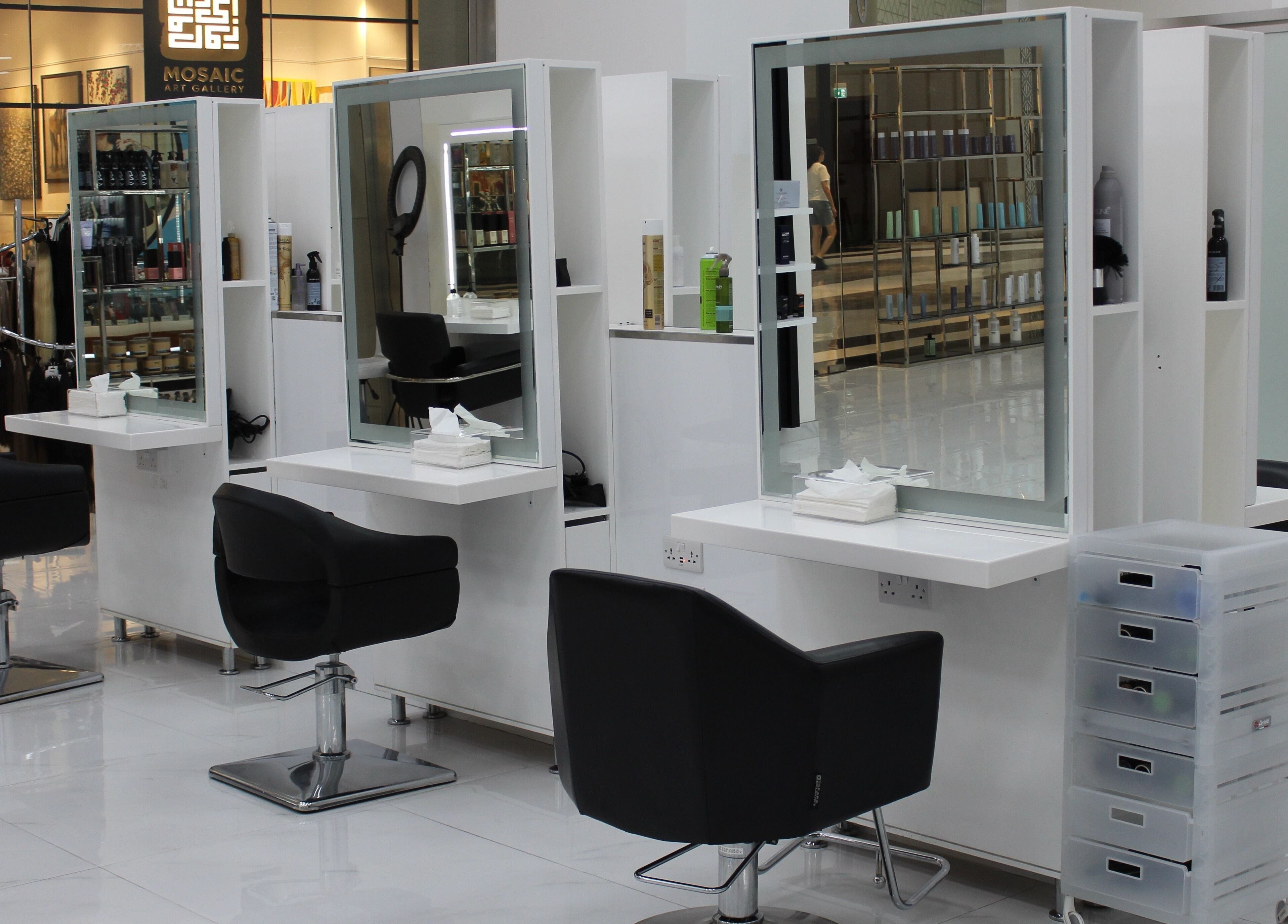 Modern salon interior of Hair Creators Gate Avenue, Dubai, Dubai, AE showcasing sleek styling stations.