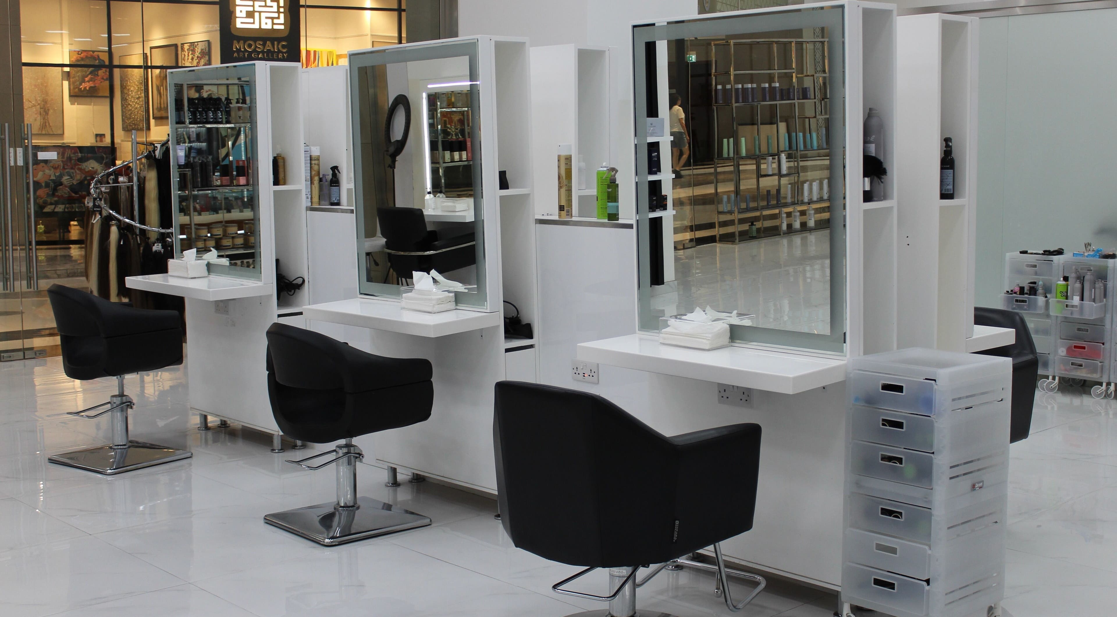Modern salon interior of Hair Creators Gate Avenue, Dubai, Dubai, AE showcasing sleek styling stations.