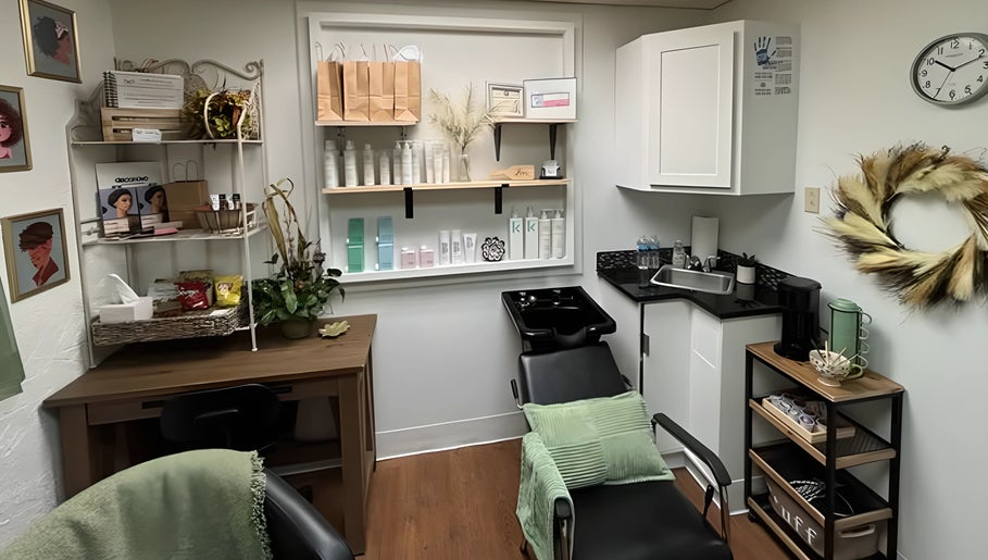 Cozy salon setup at Uninhibited Curls by Lori Peppin Hair in Lubbock, Texas, US with stylish decor and hair products.