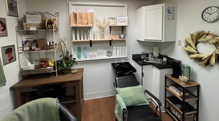 Cozy salon setup at Uninhibited Curls by Lori Peppin Hair in Lubbock, Texas, US with stylish decor and hair products.