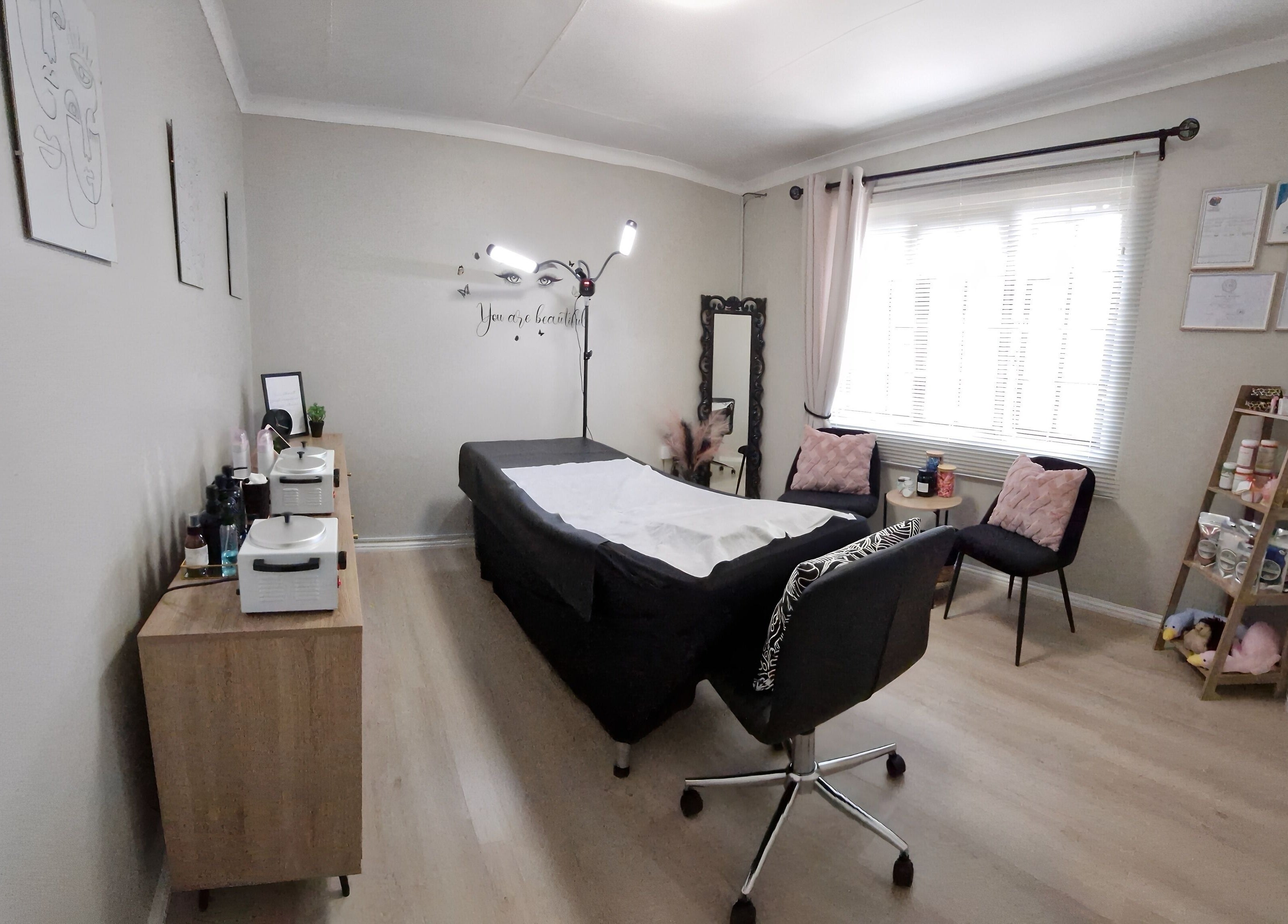 Relaxing interior at Cherish Your Beauty: Wax & Brow Studio, Edenvale, Gauteng, ZA with a treatment bed and decor.