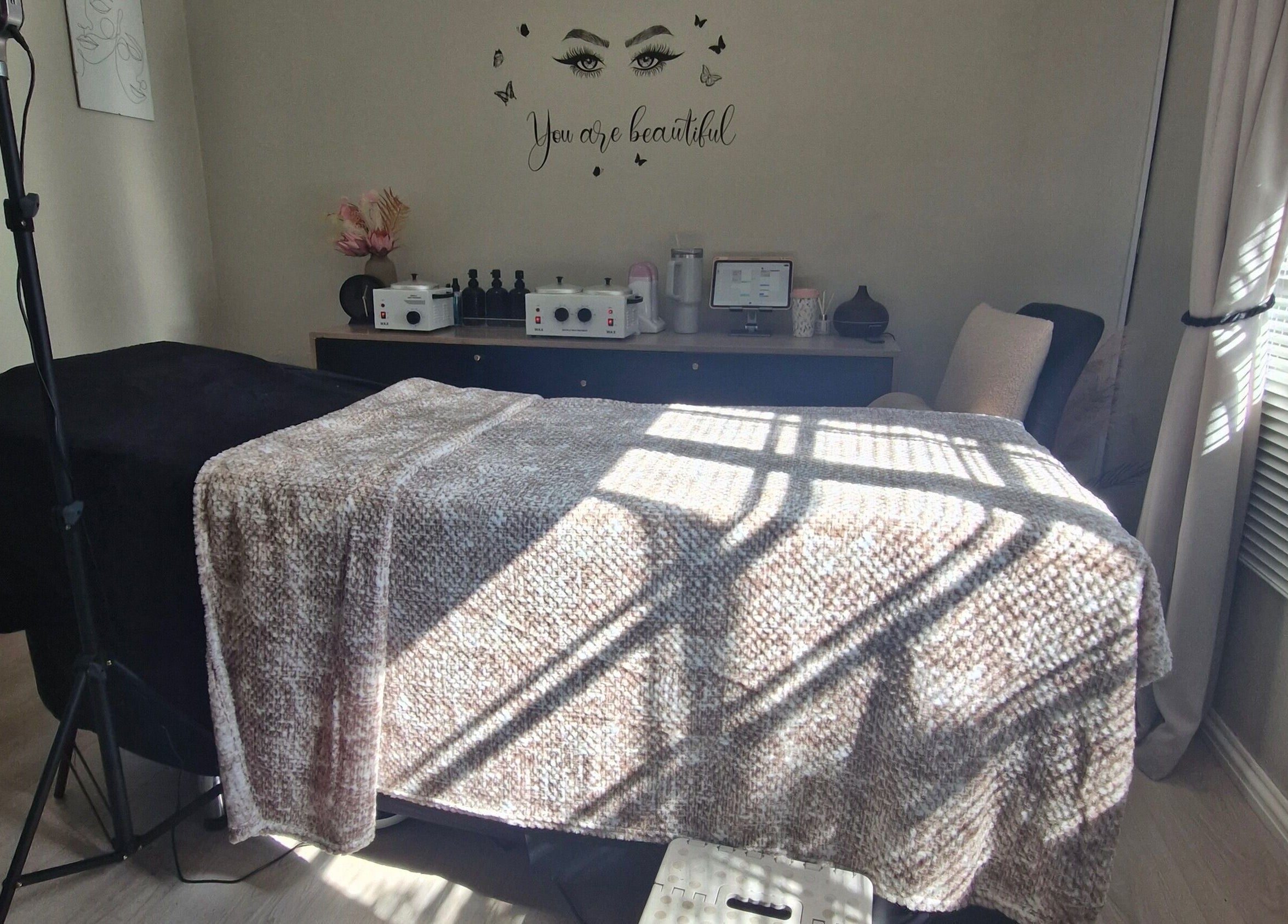 Treatment room at Cherish Your Beauty: Wax & Brow Studio, Edenvale, Gauteng, ZA with cozy decor and natural light.