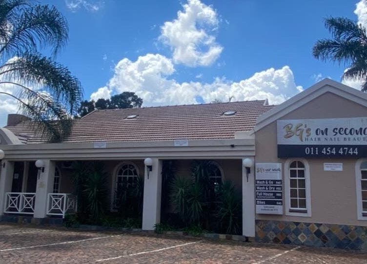 Exterior of Cherish Your Beauty: Wax & Brow Studio, Edenvale, Gauteng, ZA under a clear blue sky.